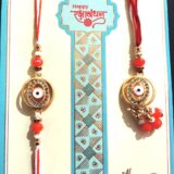 ORANGE EVIL PAIR RAKHI